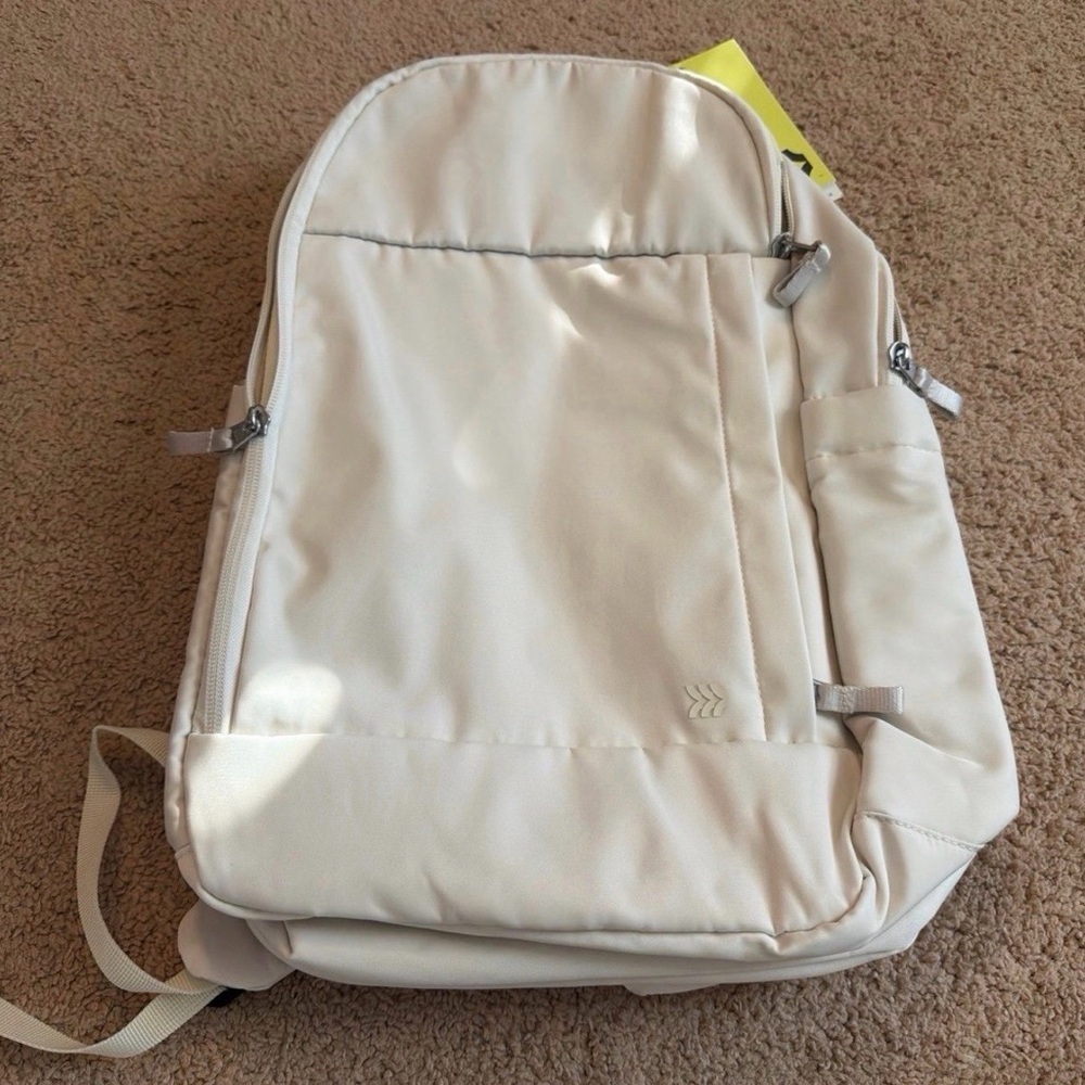 All in Motion Cream Backpack with Spacious Compartments